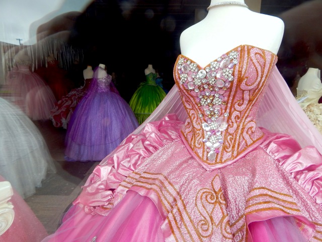 Elaborate pink dress through window copy